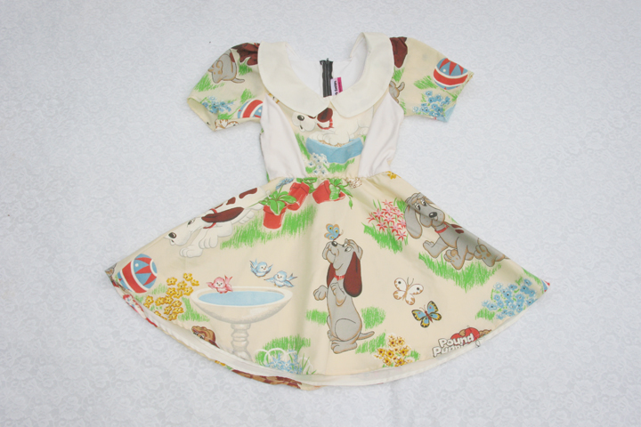 http://www.newyorkcouture.net/sold/poundpuppiesvintagedress1.jpg